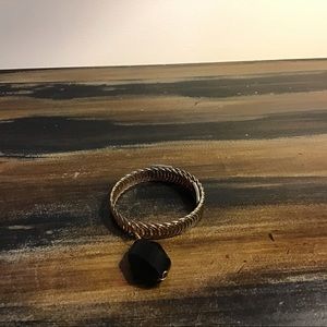 It is gold and black gem on it